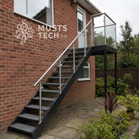 Escalier extérieur en acier sur mesure pour balcon résidentiel, fabrication architecturale, support technique