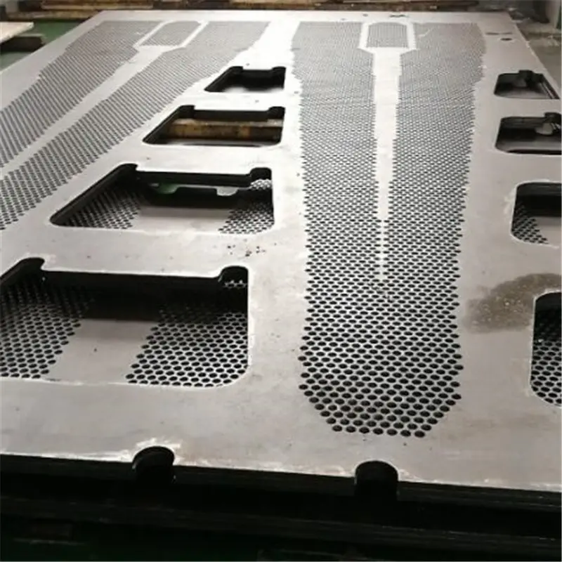 Precision machined stainless steel tube sheet by multi-hole drilling