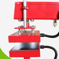 Presse à chaud pneumatique manuelle compacte pour étiquettes de col, logos, manchons et petits transferts sur vêtements (Nouveau)