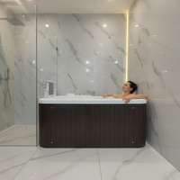 Baignoire de massage confortable moderne pour couples avec jets d'air et d'eau, idéale pour les fêtes