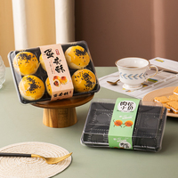 Boîtes d'emballage transparentes en PET à 6 compartiments, idéales pour les produits alimentaires tels que les macarons au chocolat et les desserts.