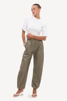 Vêtements de rue pour l'automne, pantalon de jogging taille haute pour femmes, en similicuir vert olive, taille élastique, décontracté, vente en gros OEM
