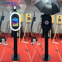 Machine de photomaton pour événements de mariage, iPad, appareil photo reflex numérique, avec design de tête ovale, éclairage LED et plateau d'impression