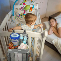 Vente chaude Accessoires pour chambre de bébé Organisateur suspendu pour lit de bébé Sac de rangement pour couches de bébé pour vêtements et jouets