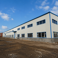 Entrepôt préfabriqué en structure métallique à grande portée, hangar industriel en métal, atelier modulaire à ossature galvanisée Q345