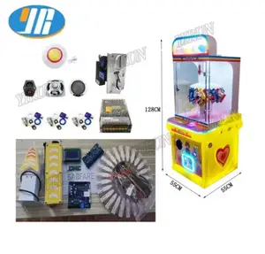 Coin Operated Mini Claw Machine 2 Players Probability Controllable Lucky Planet Clip Prize Machine