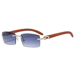 <span class=keywords><strong>Gafas</strong></span> <span class=keywords><strong>de</strong></span> <span class=keywords><strong>sol</strong></span> vintage sin montura con patillas <span class=keywords><strong>de</strong></span> madera UV400 <span class=keywords><strong>de</strong></span> moda para mujer, modelo Ocean Piece, y <span class=keywords><strong>gafas</strong></span> ópticas para <span class=keywords><strong>hombre</strong></span> con caja pequeña. - Product Image 3