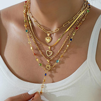 RINHOO Ensemble de colliers vintage en métal avec pendentif croix, style bohème, couleur or, perles, pour femmes, usage quotidien, vacances, rendez-vous galants