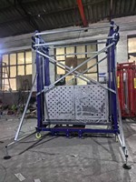 Plateforme élévatrice mobile électrique à ciseaux avec entre-essieux de 1050 mm pour l'entretien des entrepôts et la construction