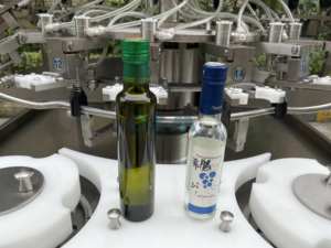 Lavadora automática de botellas de tipo inverso para limpieza de botellas de aceite cosmético y alimentos - Product Image 6