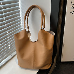 2025 nuevo bolso de mano con patrón de lichi marrón claro bolso simple diario versátil - Product Image 4