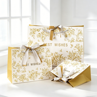 Sacs cadeaux en carton blanc de luxe personnalisés avec logo de designer, imprimés en offset, estampés à l'or, avec ruban en corde de coton