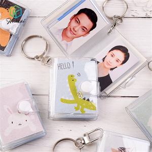 Vente en gros de <span class=keywords><strong>mini</strong></span> cartes photos holographiques transparentes en PVC pour <span class=keywords><strong>album</strong></span> <span class=keywords><strong>photo</strong></span> carte postale porte-clés 16 photos capacité 2 pouces <span class=keywords><strong>photo</strong></span> - Product Image 6