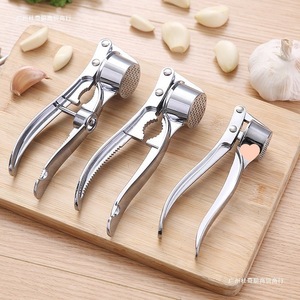 Multi Functional Garlic Press Stainless Steel Manual Garlic Crusher With Nut Cracker And <b>Bottle</b> Opener Kitchen Tool - Product Image 4