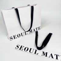 Bestseller Individuell Bedruckte Beschichtete Papier-Einkaufstasche mit Integriertem Griff für Kleidung, Schuhe und Einzelhandelsverpackungen