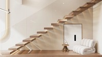 Rampe en verre artistique sur mesure à haute transparence et escalier flottant en bois pour la décoration de galeries d'art modernes et de studios créatifs
