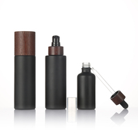 Botol kosmetik perawatan kulit, Set wadah kemasan 100ml tutup bambu Lotion kaca pompa botol Matte buram hitam
