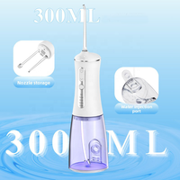 Hydropulseur dentaire portable d'usine OEM avec 4 modes de nettoyage, indice IPX7, 1800ppm, réservoir amovible de 300ml, pour marque privée