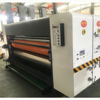 Machine industrielle haute vitesse de découpe, rainurage et impression flexographique pour la fabrication de boîtes en carton ondulé