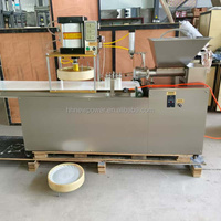Machine automatique pneumatique pour presser la pâte à pizza, la pâte à naan, la pâte à pain pita, la pâte à chapati, la pâte à tortilla, la pâte à wraps