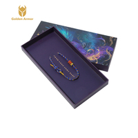 Boîte cadeau de luxe en carton bleu foncé haut de gamme personnalisée avec impression de logo en bronze pour bagues, boucles d'oreilles et colliers de supermarché
