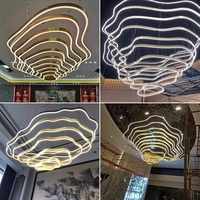 Lustre de style postmoderne pour bureau de vente, villa créative, hôtel, club-house, hall d'entrée, maison d'hôtes, avec table de sable et éclairage d'ambiance