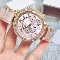 MKOriginals Montre pour femme en or rose et diamants, bracelet en acier inoxydable rose, chronographe à quartz