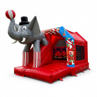 Château gonflable en PVC en forme d'éléphant de cirque avec toboggan et mur d'escalade pour location de fête en plein air