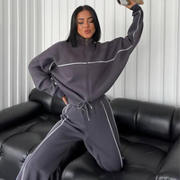 Mode européenne américaine respirant grande taille ensemble de sport femmes col rond Cardigan pull dentelle rayé décontracté Jogging vêtements
