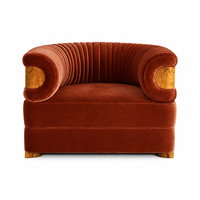 Fauteuil en velours orange brûlé avec accents en bois de burl et capitonnage cannelé pour salon