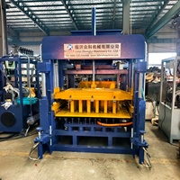 Machine hydraulique automatique à haut rendement pour la fabrication de blocs creux 4-15 et de briques pleines