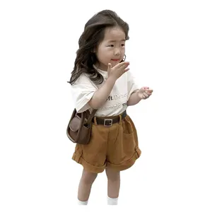 Versione coreana di abbigliamento per bambini 2023 estate nuova ragazza vestito chic chic lettere t-shirt pantaloncini casual alla moda vestito