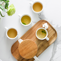 Service à thé en porcelaine céramique de luxe de style nordique exquis, avec fonction de chauffage par bougie, nouveau design, emballage cadeau couleur, vente en gros
