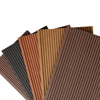 WPC imperméable PVC résistant à l'eau artificiel creux Composite platelage co-extrudé bois facile à installer jardin extérieur