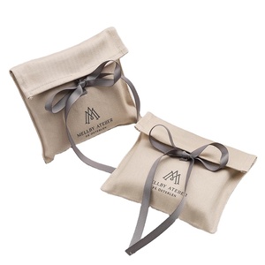 Pochette promotionnelle en coton biologique écologique avec bouton-pression, taille et couleur personnalisables, certifiée GOTS, pour autocollants et cadeaux - Product Image 1