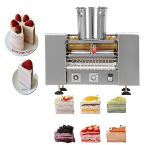 Machine automatique de remplissage de cupcakes et de dépose de garnitures pour la création de gâteaux d'anniversaire avec peau de crêpe - Product Image 1