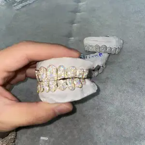 Sparkle Custom Made Hip Hop Iced Out 925 griglie in argento Sterling gioielli in oro impostazione a zig-zag VVS Moissanite denti bocca Grillz