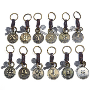 Porte-clés vintage 12 signes <span class=keywords><strong>du</strong></span> zodiaque, pendentif constellation en bronze avec anneau en cuir tressé pour hommes et femmes - Product Image 2