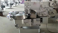 Machine de traitement du chocolat pour l'enrobage automatique des bonbons au chocolat et l'emballage de bonbons à double torsion