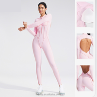 Combinaison de yoga et de fitness zippée à manches longues pour femme, style pantalon long moulant dos nu avec design épuré, idéale pour l'extérieur