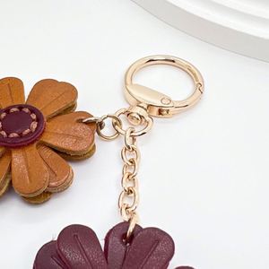 PU Leather Flower Keychain Creative Daisy Flower Bag <b>Charm</b> Chrysanthemum <b>Charms</b> <b>Keyring</b> for Purse - Product Image 4