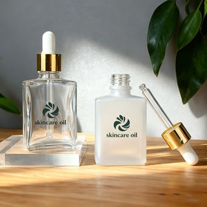 Botella de Vidrio Transparente Esmerilada Cuadrada de 15 ml, 30 ml, 50 ml, 100 ml con Gotero para Suero para el Cuidado de la Piel, Rectangular para Aceite Esencial - Product Image 1