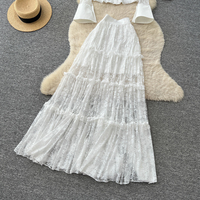 Ensemble 2 pièces élégant en dentelle à manches longues et jupe longue à volants taille haute pour femme – Collection Printemps-Été