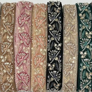 ผ้าลูกไม้เจ้าสาวปี 2026 พร้อมลายปักเลื่อมดอกไม้ ผ้าจากโรงงานสำหรับชุดผู้หญิง - Product Image 1