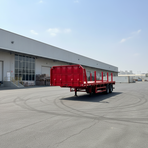 Semi-remorque plateau <span class=keywords><strong>utilitaire</strong></span> en acier à 3 essieux Starway Vehicle avec piquets, capacité de charge de 60 000 kg pour le <span class=keywords><strong>transport</strong></span> du bois - Product Image 1
