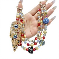 Chaîne de téléphone Evil Eye, perles, strass, médaillon doré, porte-clés, cordon, breloque de sac, porte-clés de voiture, personnalisable, haut de gamme, 15 cm