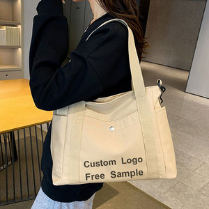 Logo personnalisé toile <span class=keywords><strong>sac</strong></span> fourre-tout femmes 2025 nouveau grand <span class=keywords><strong>sac</strong></span> à provisions Style coréen <span class=keywords><strong>sac</strong></span> à bandoulière pour l'école de <span class=keywords><strong>travail</strong></span> en gros <span class=keywords><strong>pas</strong></span> <span class=keywords><strong>cher</strong></span> prix - Product Image 5