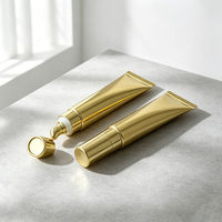 Tube cosmétique brillant doré avec bouchon à vis, impression sérigraphique, contenant vide compressible pour baume à lèvres, kit de voyage