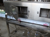Machine d'étiquetage de manchons pour bouteilles, canettes, barils (emballages plastiques/verre)