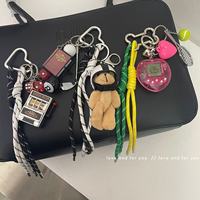 Porte-clés multifonctionnel en alliage de zinc DIY, sac à dos, accessoires vestimentaires, collection de cordons tissés, touche personnelle